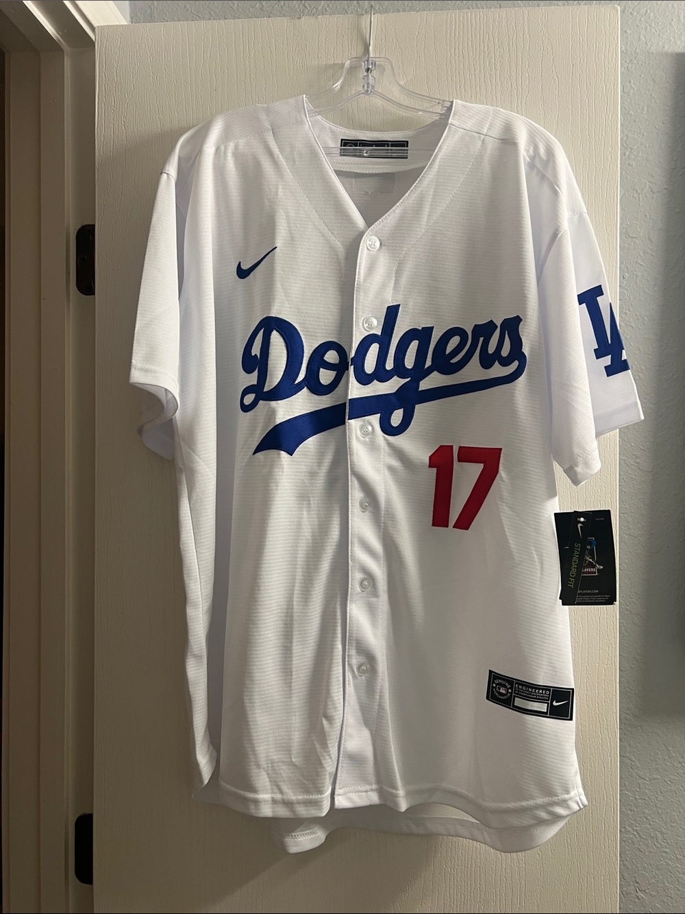 Nike White Jersey with Black Label and Swoosh